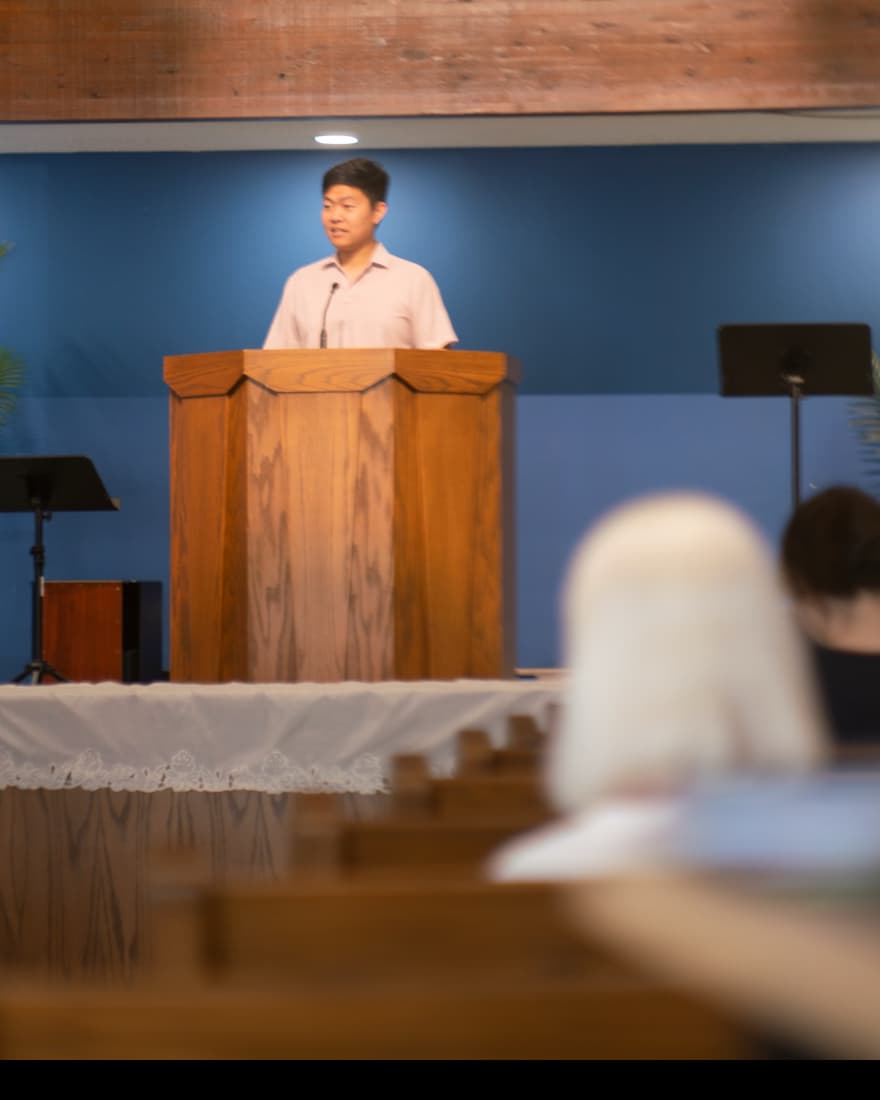 Pastor preaching from the pulpit at First Baptist Church of Artesia