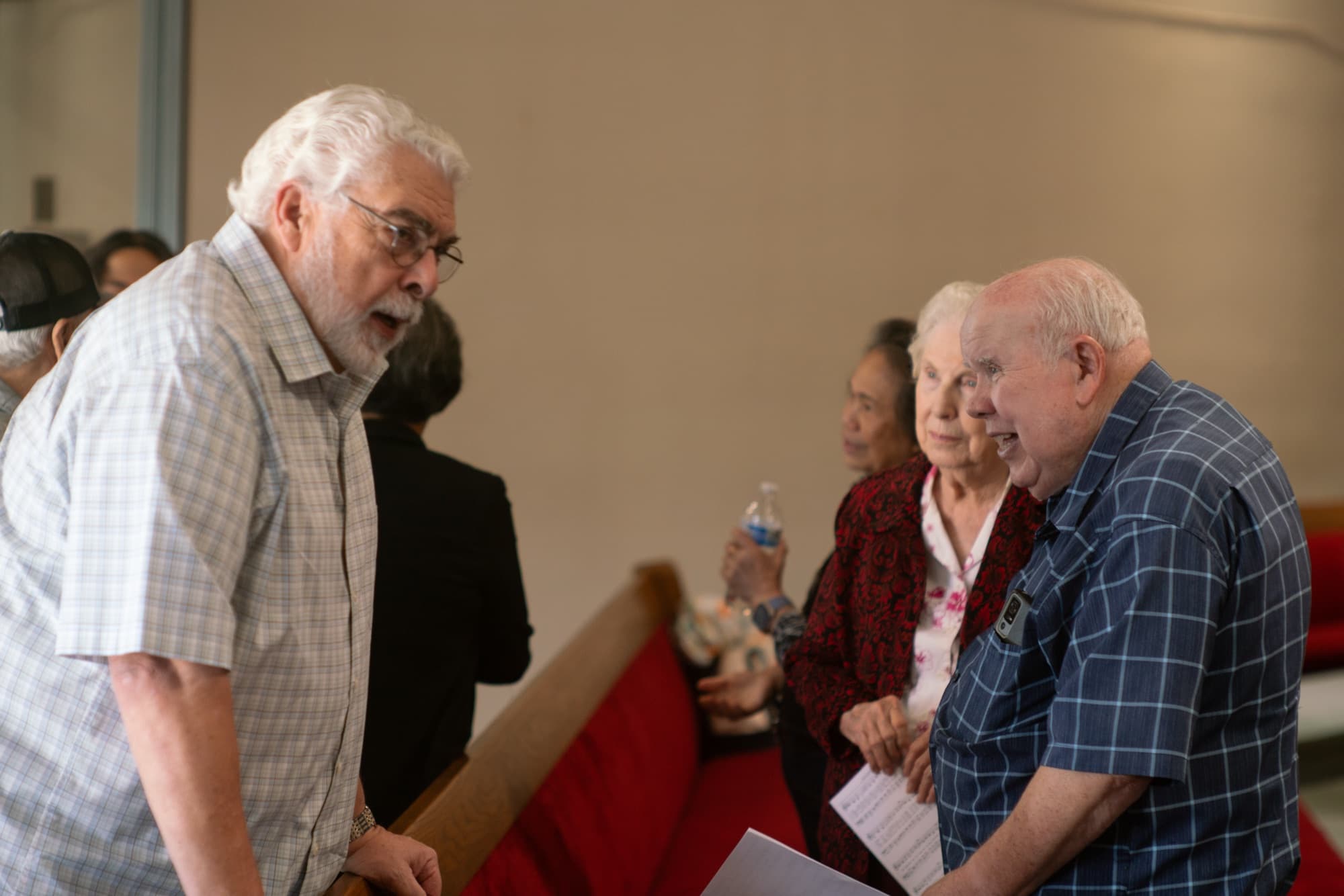 Members in conversation after the service
